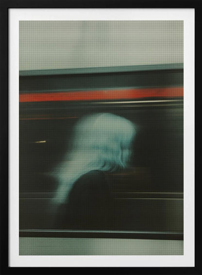 An abstract photograph with motion blur, featuring the ghostly silhouette of a person's head and shoulders in pale blue. The dark background is streaked with horizontal lines of red and white light, suggesting the speed of a passing train or subway. Wall Art