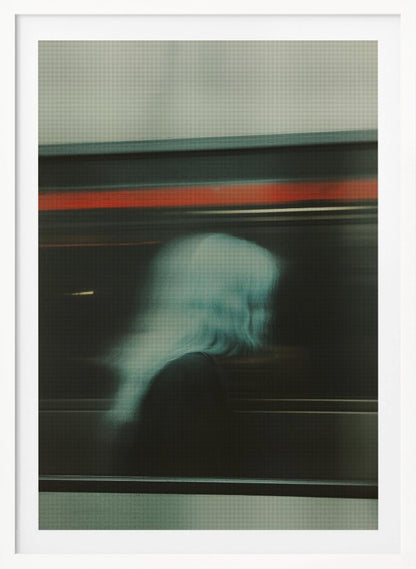 An abstract photograph with motion blur, featuring the ghostly silhouette of a person's head and shoulders in pale blue. The dark background is streaked with horizontal lines of red and white light, suggesting the speed of a passing train or subway. Wall Art