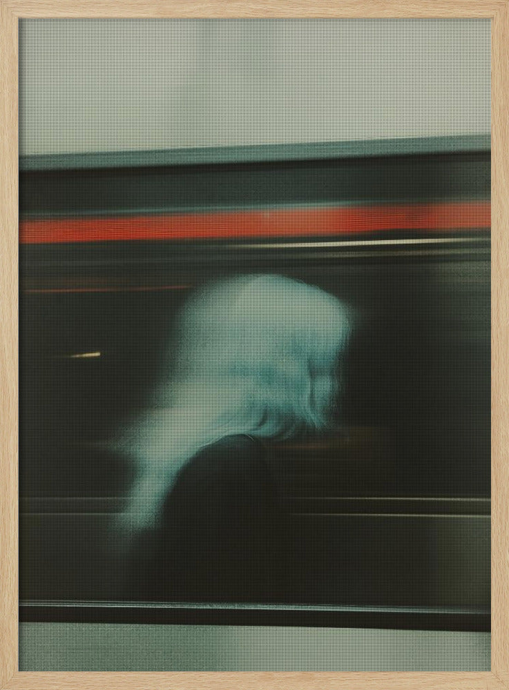 An abstract photograph with motion blur, featuring the ghostly silhouette of a person's head and shoulders in pale blue. The dark background is streaked with horizontal lines of red and white light, suggesting the speed of a passing train or subway. Wall Art