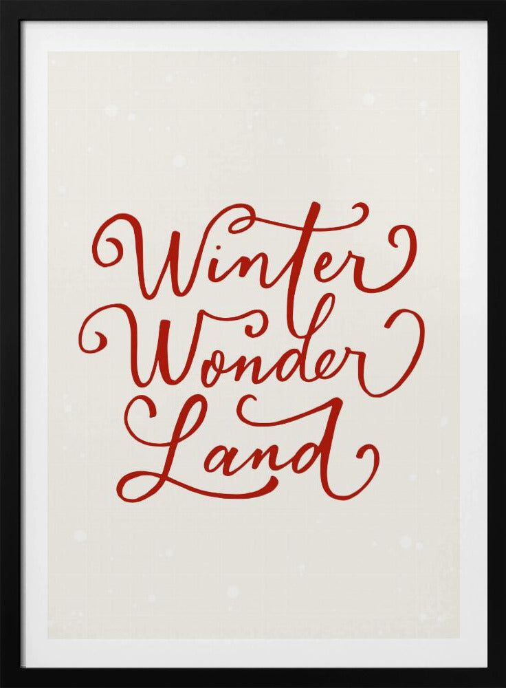 A holiday-themed art print with the words 'Winter Wonder Land' written in a flowing red script font on a speckled, off-white background, all enclosed within a simple black frame. Artwork