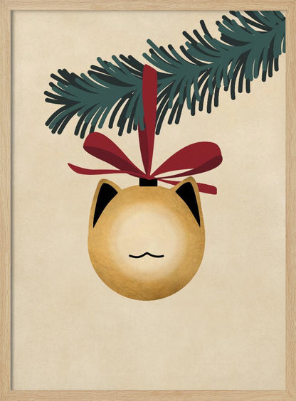 A minimalist illustration of a golden-yellow Christmas ornament shaped like a cat's head, complete with black-tipped ears and a simple line mouth. It hangs from a dark green pine branch by a festive red ribbon, all set against a textured beige background and framed in black. Artwork