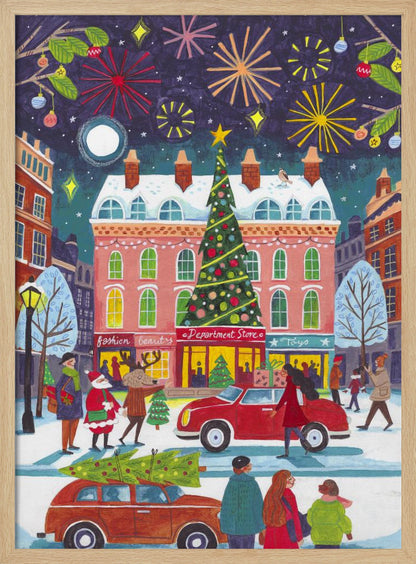 A whimsical illustration of a bustling city street at night during winter. The scene is festive, with a large decorated Christmas tree in front of a pink department store, fireworks lighting up the dark sky, and snow-covered streets filled with people, cars, Santa Claus, and a reindeer. Print