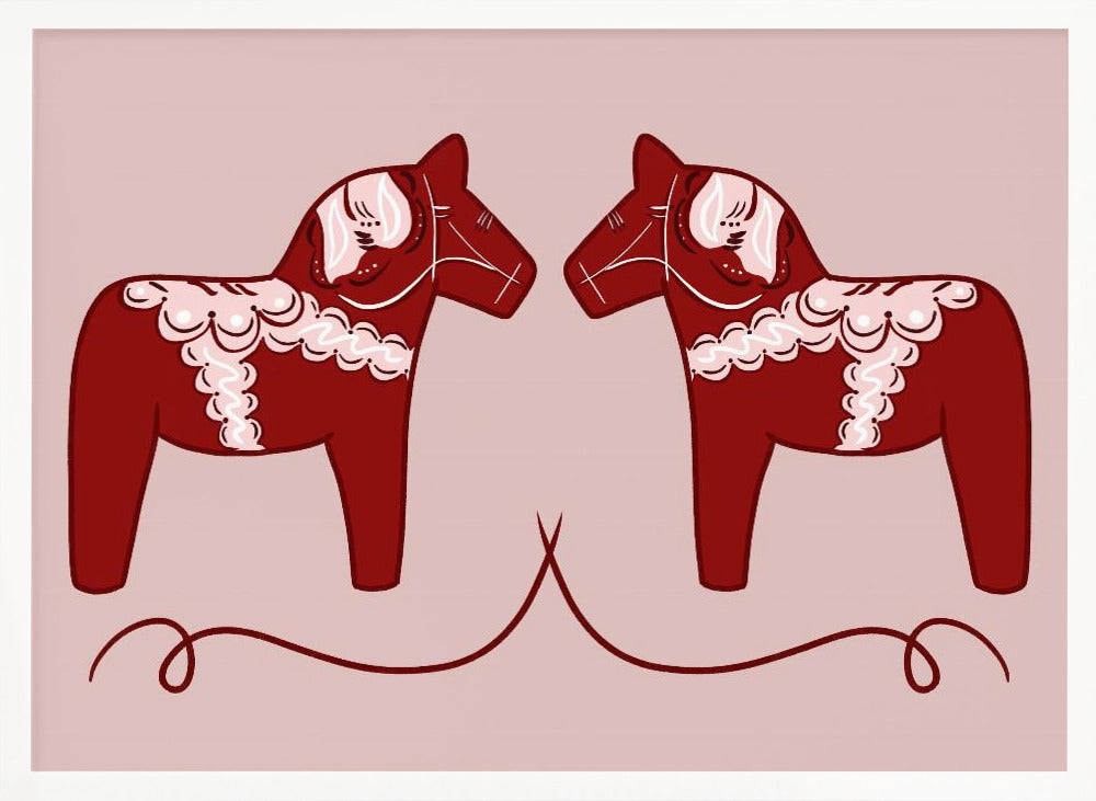 A symmetrical illustration of two red Swedish Dala horses facing each other against a light pink background. The horses are decorated with intricate white and pink folk art patterns. The artwork is presented within a silver frame. Artwork
