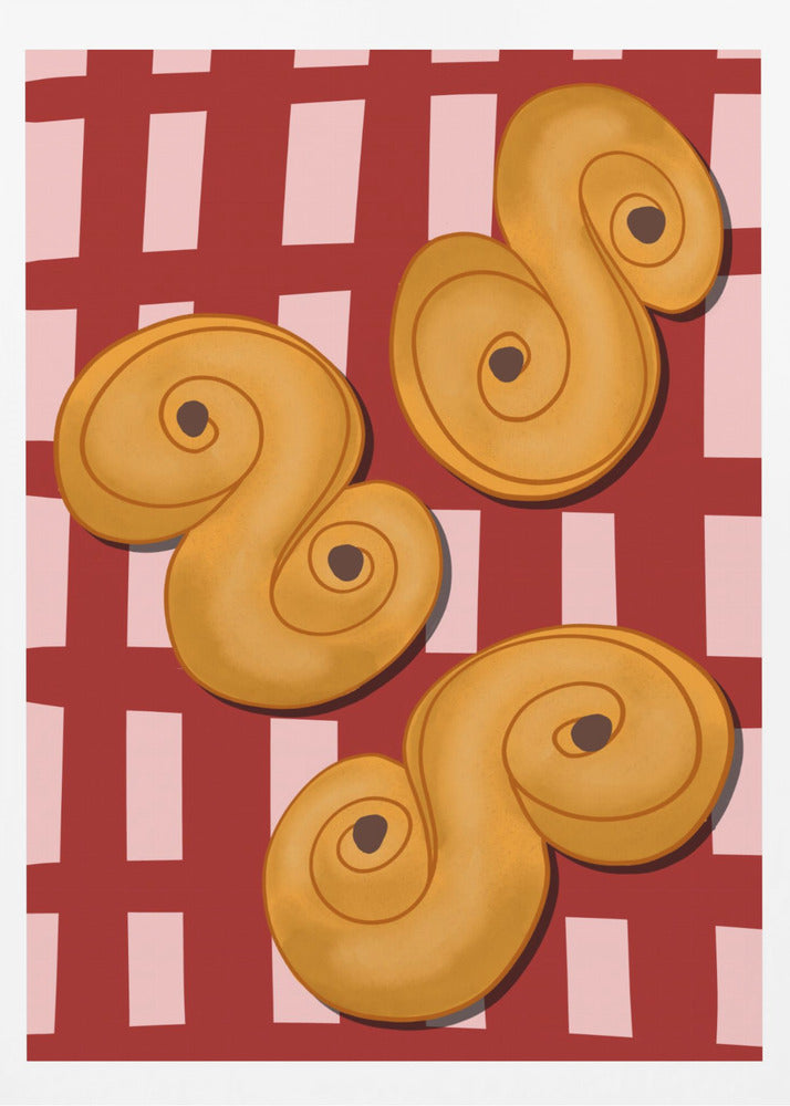A vibrant illustration of three golden-yellow S-shaped pastries, resembling Swedish saffron buns, resting on a red and pink checkered tablecloth. The artwork is presented within a black frame. Decor