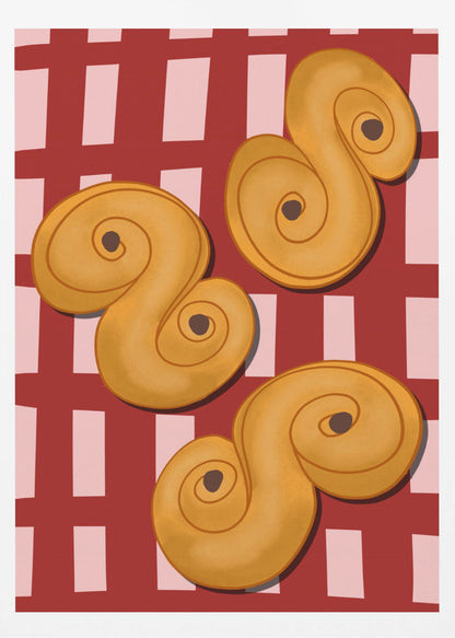 A vibrant illustration of three golden-yellow S-shaped pastries, resembling Swedish saffron buns, resting on a red and pink checkered tablecloth. The artwork is presented within a black frame. Decor