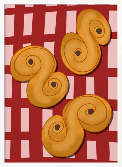 A vibrant illustration of three golden-yellow S-shaped pastries, resembling Swedish saffron buns, resting on a red and pink checkered tablecloth. The artwork is presented within a black frame. Decor
