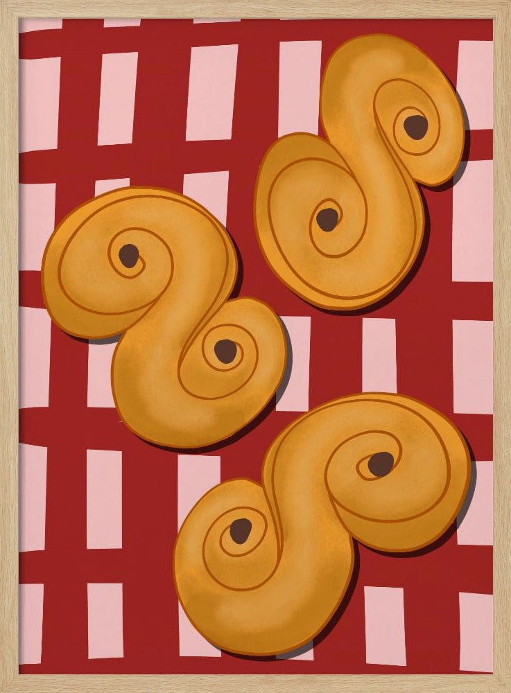 A vibrant illustration of three golden-yellow S-shaped pastries, resembling Swedish saffron buns, resting on a red and pink checkered tablecloth. The artwork is presented within a black frame. Decor