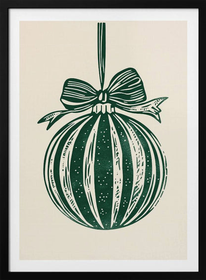 A vintage-style linocut print of a dark green Christmas bauble with a large bow, hanging against a cream background. The ornament features vertical stripes and white speckles, and the entire artwork is presented in a simple black frame. Artwork