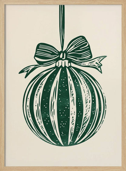 A vintage-style linocut print of a dark green Christmas bauble with a large bow, hanging against a cream background. The ornament features vertical stripes and white speckles, and the entire artwork is presented in a simple black frame. Artwork