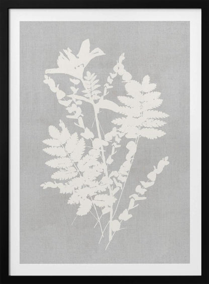 A framed artwork featuring a white silhouette of a botanical arrangement with ferns, flowers, and leaves against a textured light grey background. Decor