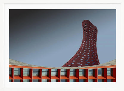 A modern architectural photograph showing a curved, maroon skyscraper twisting towards the sky against a gradient grey background. A lower, orange, grid-like building curves along the bottom of the frame. The entire scene is enclosed in a silver frame. Poster