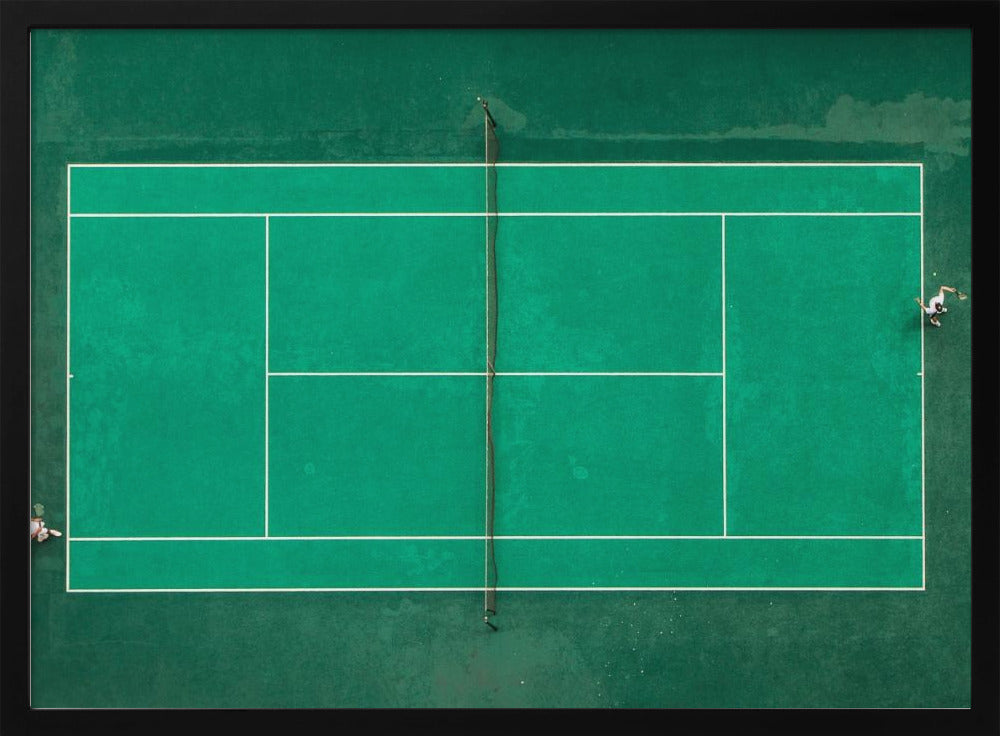 An aerial top-down photograph of a vibrant green tennis court with two players in the middle of a game, one on the far left and the other on the far right, all enclosed within a brushed silver frame. Print