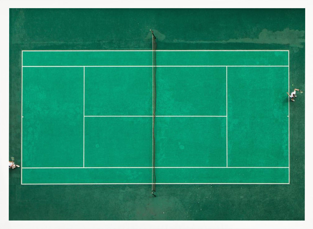 An aerial top-down photograph of a vibrant green tennis court with two players in the middle of a game, one on the far left and the other on the far right, all enclosed within a brushed silver frame. Print