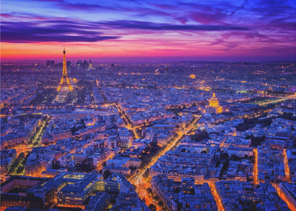 An aerial panoramic view of Paris at dusk, with the cityscape illuminated in cool blue and warm yellow lights. The Eiffel Tower is prominently lit on the left under a dramatic sunset sky transitioning from orange and pink to deep purple. Poster
