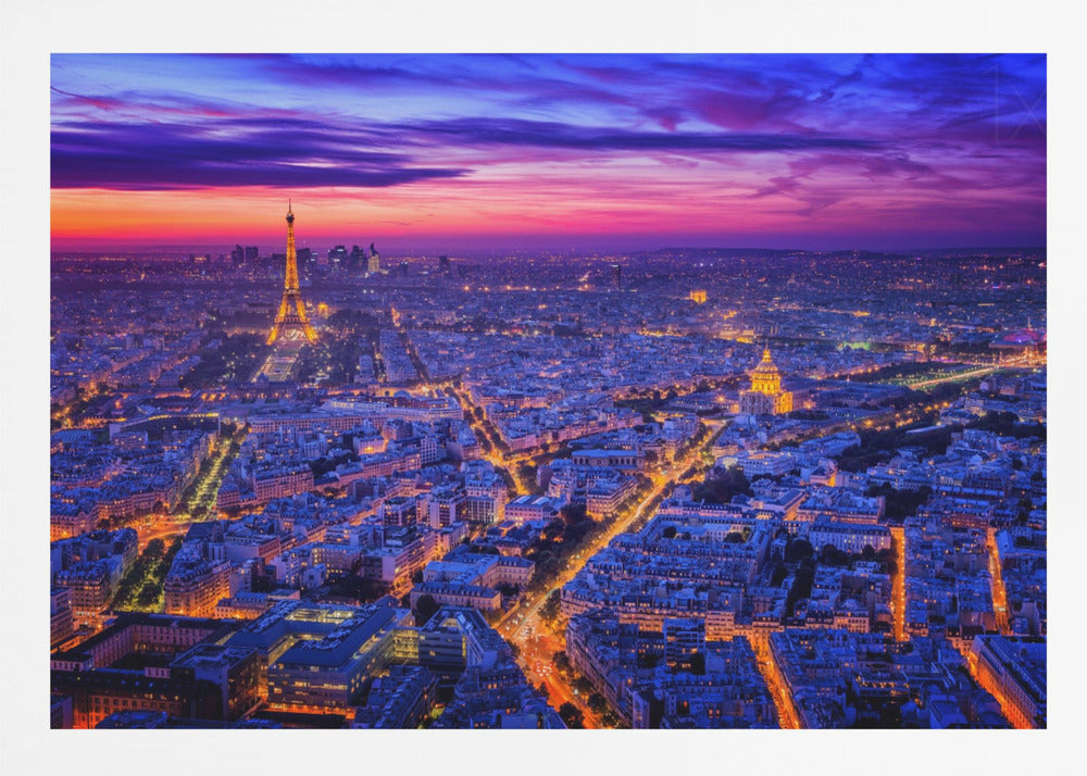 An aerial panoramic view of Paris at dusk, with the cityscape illuminated in cool blue and warm yellow lights. The Eiffel Tower is prominently lit on the left under a dramatic sunset sky transitioning from orange and pink to deep purple. Poster