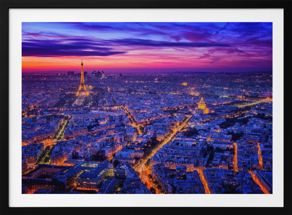 An aerial panoramic view of Paris at dusk, with the cityscape illuminated in cool blue and warm yellow lights. The Eiffel Tower is prominently lit on the left under a dramatic sunset sky transitioning from orange and pink to deep purple. Poster