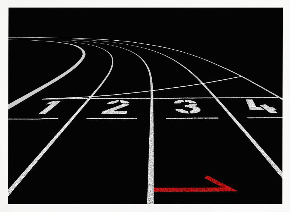 A framed, high-contrast photograph of a black running track's starting line. The lanes, marked with white lines, are numbered 1, 2, 3, and 4 and curve into the distance. A single red arrow points forward in the foreground, adding a pop of color to the monochrome scene. Poster