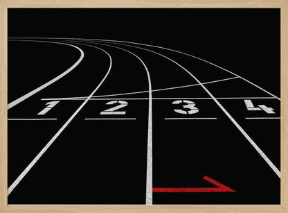A framed, high-contrast photograph of a black running track's starting line. The lanes, marked with white lines, are numbered 1, 2, 3, and 4 and curve into the distance. A single red arrow points forward in the foreground, adding a pop of color to the monochrome scene. Poster