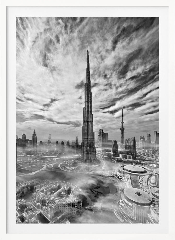 A dramatic black and white high-angle photograph of the Burj Khalifa dominating the Dubai cityscape, with swirling clouds above and a light mist surrounding the buildings below, all enclosed in a black frame. Poster