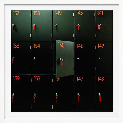 A head-on shot of a grid of black lockers inside a light wood frame. Each locker has a bright orange number and a key with a red tag. Locker number 150 is open, creating a focal point in the otherwise uniform pattern. Wall Art