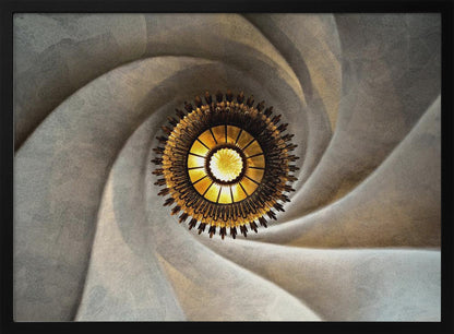 A low-angle, centered photograph looking up at an ornate, golden sunburst chandelier hanging from the vortex of a swirling, textured cream-colored ceiling, enclosed in a silver frame. Poster