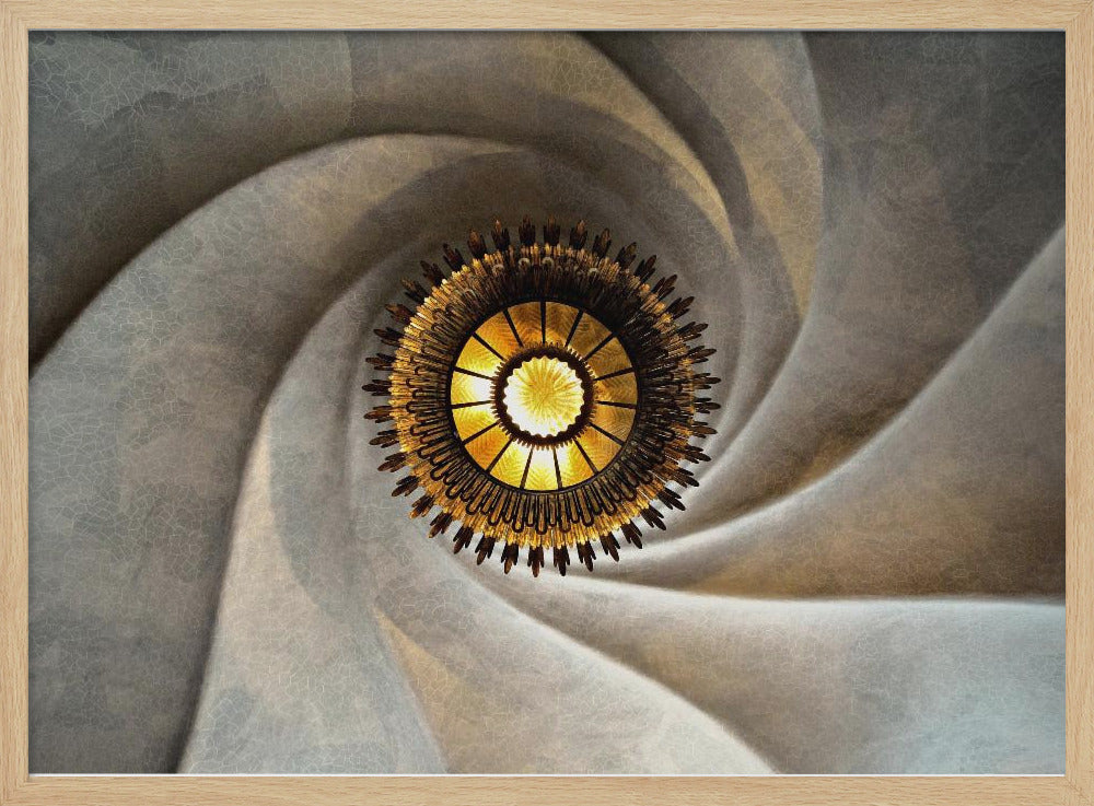A low-angle, centered photograph looking up at an ornate, golden sunburst chandelier hanging from the vortex of a swirling, textured cream-colored ceiling, enclosed in a silver frame. Poster