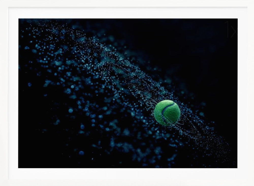 A high-speed photograph captures a spinning green tennis ball against a black background, with a dramatic spray of blue-lit water droplets flying off it in a cosmic-like spiral. Artwork
