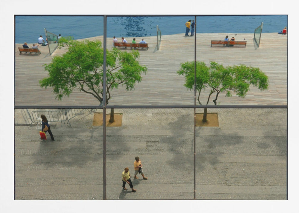 A framed, multi-pane window view showing a composite urban scene. The top panes reflect a sunny day on a wooden boardwalk by blue water, with people relaxing and green trees. The bottom panes show a direct view of a paved street below, with a few pedestrians walking. The window mullions create a grid that divides the distinct scenes. Wall Art