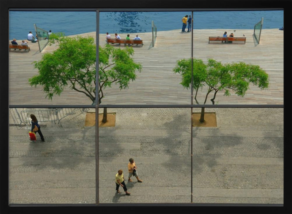 A framed, multi-pane window view showing a composite urban scene. The top panes reflect a sunny day on a wooden boardwalk by blue water, with people relaxing and green trees. The bottom panes show a direct view of a paved street below, with a few pedestrians walking. The window mullions create a grid that divides the distinct scenes. Wall Art
