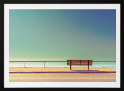 A minimalist, retro-toned photograph of a solitary wooden bench on a sunlit seaside promenade, overlooking a calm turquoise ocean under a vast, clear blue-green sky. Poster