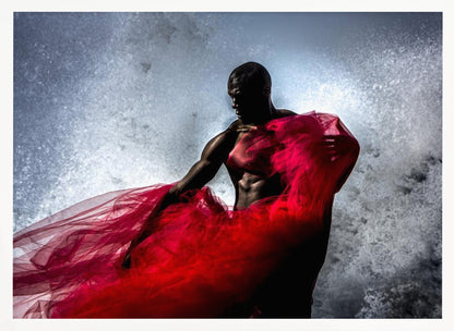 A dramatic photograph of a muscular Black man, mostly in shadow, holding a voluminous, sheer red fabric against a backdrop of splashing white water. The image is encased in a silver frame. Poster