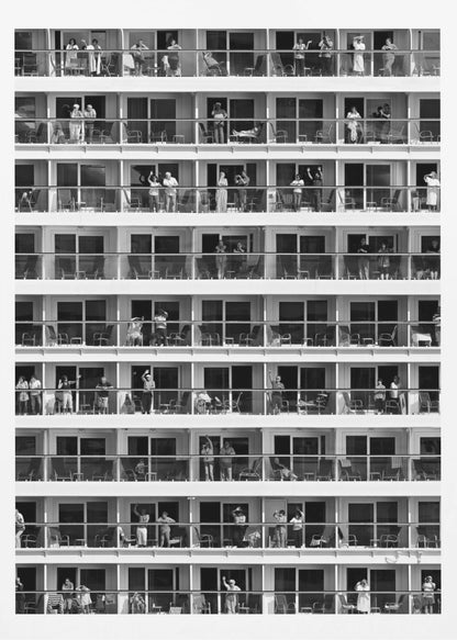 A black and white, high-contrast photograph of the side of a cruise ship, showing a grid of balconies across multiple decks. Various passengers are visible on their balconies, some waving, some relaxing, and some observing, creating a pattern of individual human stories within the repetitive architectural structure. Poster