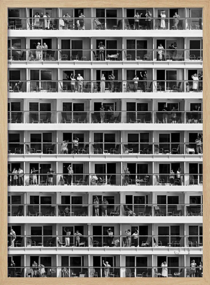 A black and white, high-contrast photograph of the side of a cruise ship, showing a grid of balconies across multiple decks. Various passengers are visible on their balconies, some waving, some relaxing, and some observing, creating a pattern of individual human stories within the repetitive architectural structure. Poster