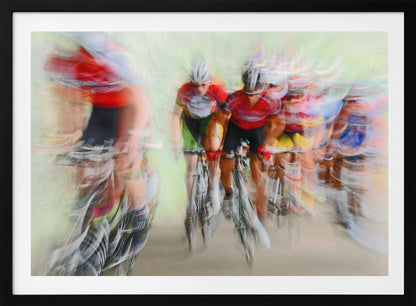 An abstract photograph of a group of cyclists in a race, captured with motion blur to create a dynamic sense of speed. The riders' red jerseys and the green background are streaked together, with a silver frame surrounding the image. Artwork