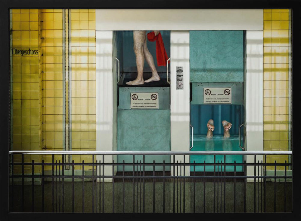 A surreal, framed artwork depicting two teal-colored vertical cabins against a yellow tiled wall. In the left cabin, a person's bare legs are visible as they hold a red towel. In the right cabin, which is filled with water, only a pair of feet can be seen submerged. A black railing is in the foreground, adding to the strange, layered composition. Artwork