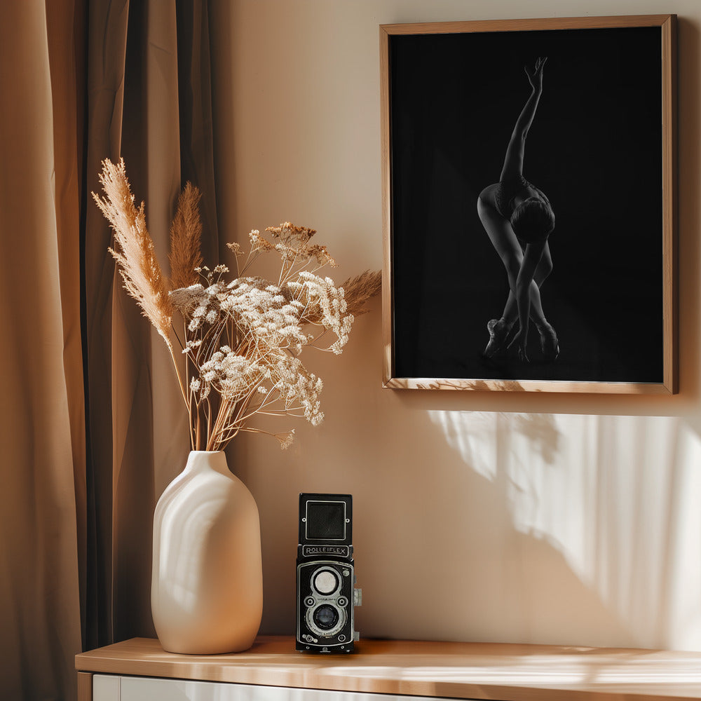 string. the ballerina is standing on pointe shoes leaning forward and wrapping her arm around - Poster / Art Print - interiör