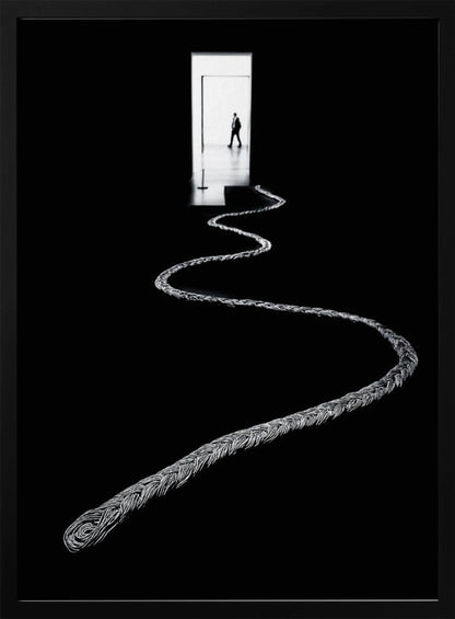 A high-contrast, black and white photograph of a thick, silver, braided rope winding across a black floor, leading towards a brightly lit doorway in the distance where a silhouetted man is walking away. Wall Art