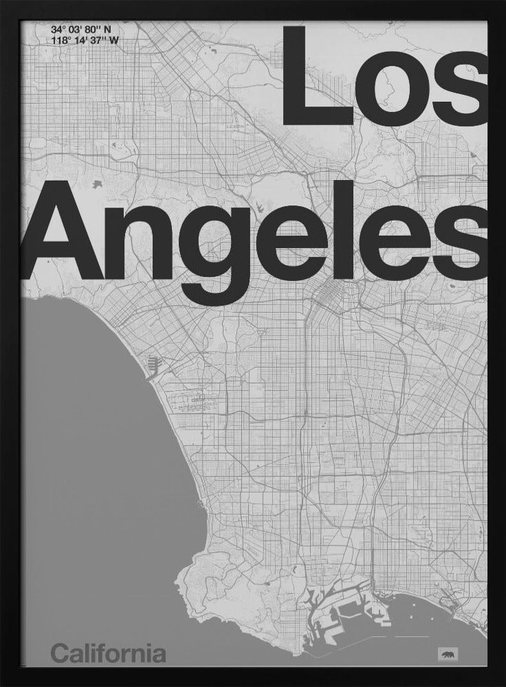 A minimalist black and white framed map of Los Angeles. The poster features a detailed street grid of the city and its coastline. The words 'Los Angeles' are overlaid in a large, bold, black sans-serif font. In the top-left corner are the coordinates, and in the bottom-left is the word 'California'. Decor