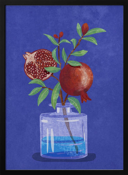 A vibrant illustration of a pomegranate branch in a clear glass vase against a deep blue, textured background. The branch features bright green leaves, a whole red pomegranate, and another cut in half to show its seeds. Decor