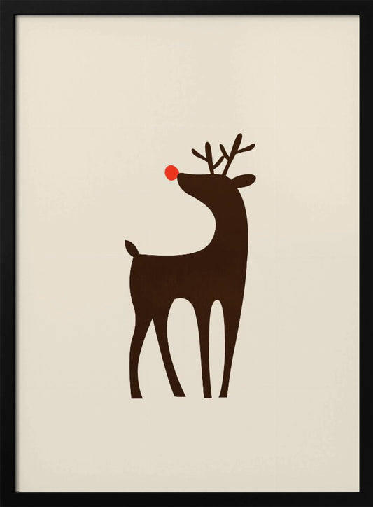 A minimalist art print of a stylized brown reindeer with a bright red nose, standing in profile against a cream-colored background, all enclosed in a simple black frame. Print
