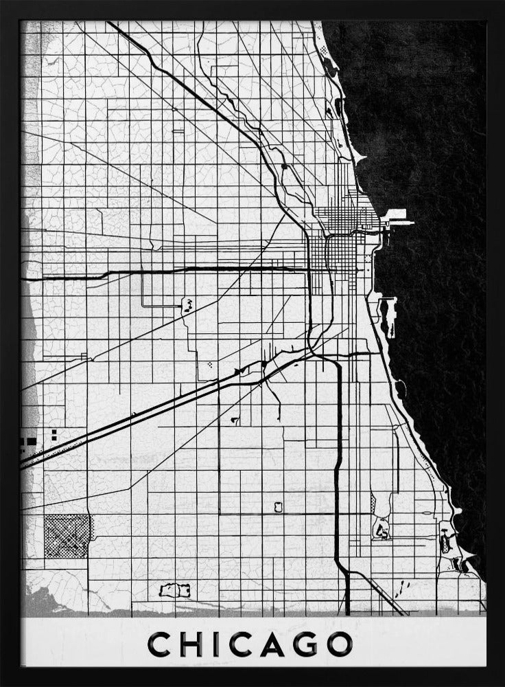 A minimalist black and white map of Chicago, featuring a grid street layout, major thoroughfares, and the shoreline of Lake Michigan. The map has a subtle crackled texture, is enclosed in a black frame, and has the word 'CHICAGO' in capital letters at the bottom. Decor