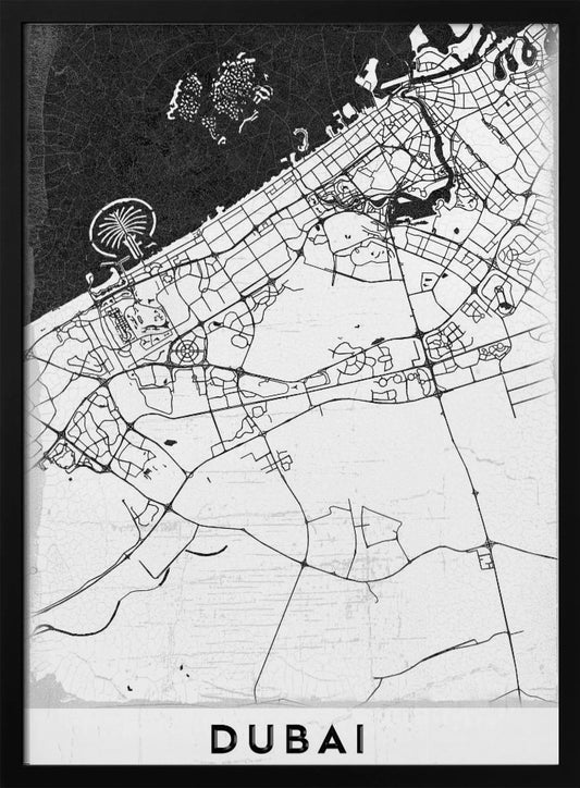 A minimalist black and white map of Dubai in a black frame. The water is depicted in black with a subtle texture, while the land is white, showing the city's road network in thin black lines. Key features like the Palm Jumeirah and The World Islands are visible off the coast. The word 'DUBAI' is written in a bold, black, sans-serif font at the bottom. Decor