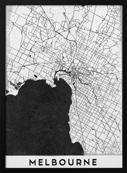 A minimalist black and white map of Melbourne, Australia, presented in a black frame. The city's road network is depicted with fine black lines on a textured white background, while the adjacent bay is shown in solid, textured black. The name 'MELBOURNE' is written in a bold, black font at the bottom. Poster