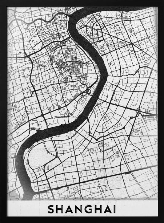 A minimalist black and white street map of Shanghai in a black frame. The map highlights the city's road network and the prominent Huangpu River, with the name 'SHANGHAI' printed at the bottom. Decor