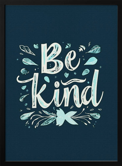An inspirational art print with a dark blue background featuring the phrase 'Be Kind' in a stylized, hand-lettered white and light blue font. The text is decorated with small leaves, hearts, and flourishes in shades of teal and white. Artwork