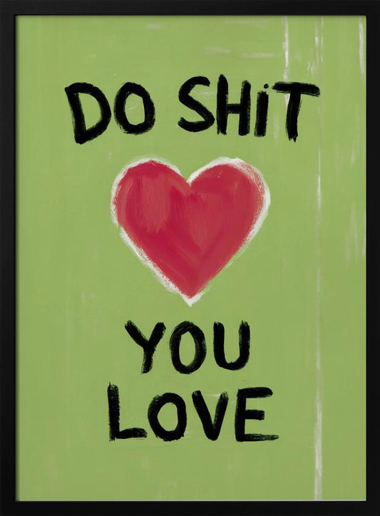 A framed modern art print with a light green background featuring the motivational phrase 'DO SHIT YOU LOVE' in black, hand-painted letters. A large, stylized red heart is painted between the top and bottom lines of text. Print