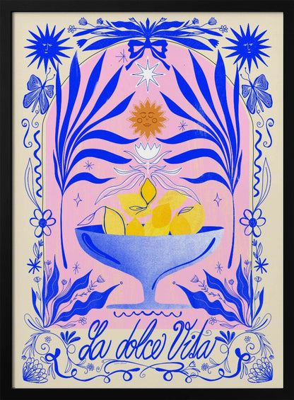 A vibrant, symmetrical illustration featuring a blue bowl of yellow lemons set against a pink arched background. The scene is framed by elaborate blue botanicals, flowers, butterflies, and celestial symbols like suns with faces. At the bottom, the phrase 'La dolce Vita' is written in elegant blue script. Decor