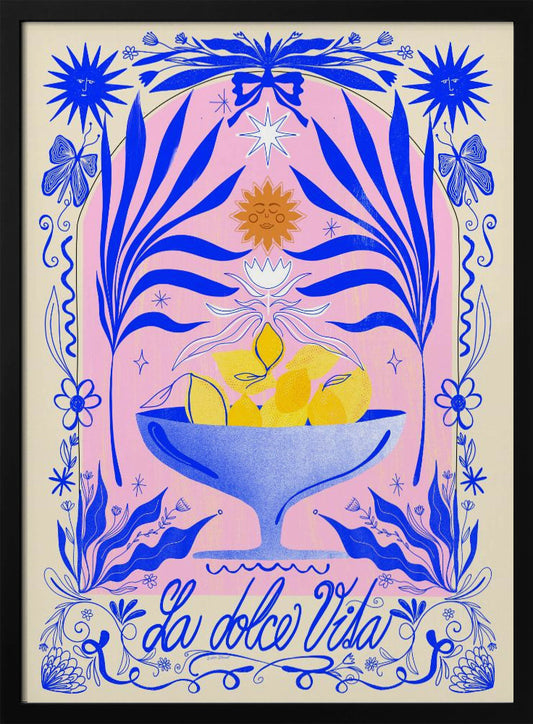A vibrant, symmetrical illustration featuring a blue bowl of yellow lemons set against a pink arched background. The scene is framed by elaborate blue botanicals, flowers, butterflies, and celestial symbols like suns with faces. At the bottom, the phrase 'La dolce Vita' is written in elegant blue script. Decor
