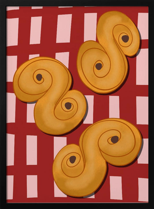 A vibrant illustration of three golden-yellow S-shaped pastries, resembling Swedish saffron buns, resting on a red and pink checkered tablecloth. The artwork is presented within a black frame. Decor