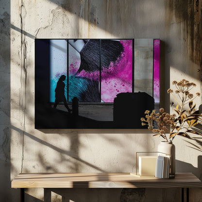 A framed photograph of a street scene where a person's silhouette is captured walking past a large, vibrant window advertisement. The ad features a close-up of a makeup brush with explosions of magenta and cyan powder. The foreground is cast in deep shadow, creating a dramatic contrast. Print